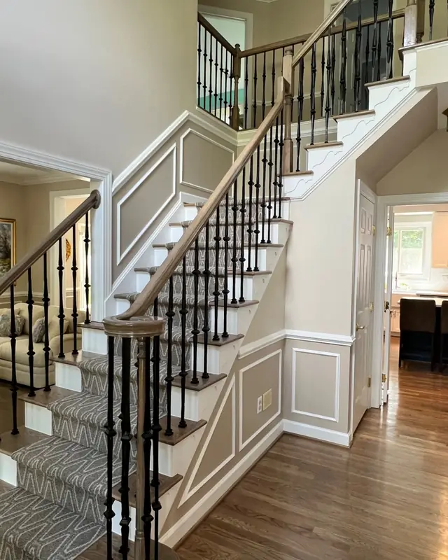 Staircase & hardwood by Maryland Carpet and Tile